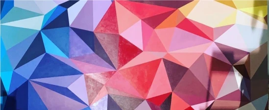 Abstract geometric multicolored background with triangular facets.